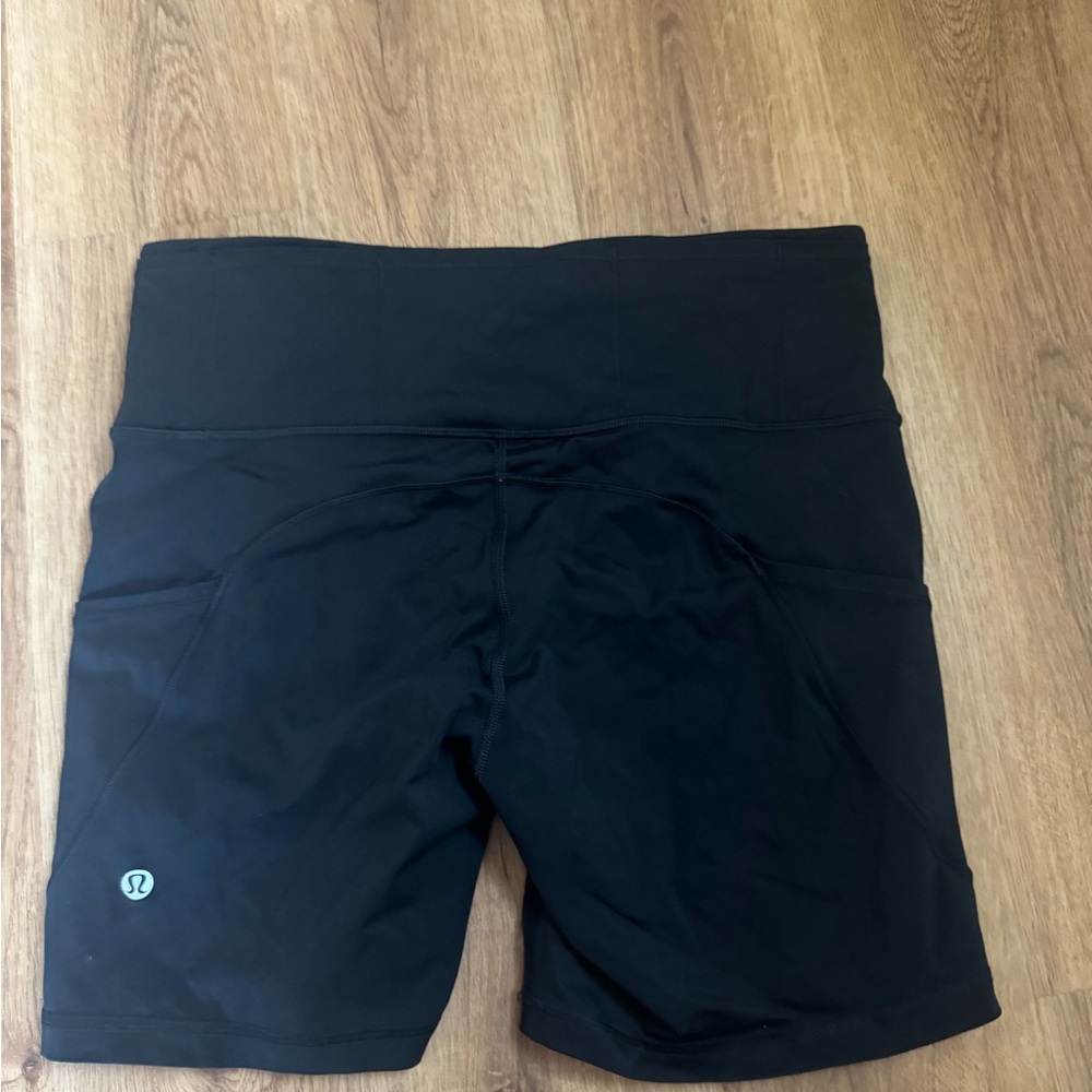 Lululemon Black Biker Shorts with multiple pockets